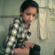 A hidden camera in a bathroom records an Hispanic girl taking a shit while sitting on a toilet. There is no audio, but the facial expressions are great. About 2 minutes.